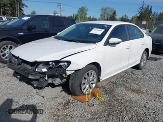 2012 Volkswagen Passat S with VIN 1VWAH7A33CC020242, listed as a IAAI auction lot 42034882 with 188,488 mi miles and . Bid and sale history available at DreamBid. Image 2.