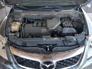 2012 Mazda CX-9 Grand Touring z VIN JM3TB2DA6C0348788, wystawiony jako Copart lot #52444915 z przebiegiem 130 392 mil mil oraz Szkoda całkowita • Salvage title. Historia ofert i sprzedaży dostępna na DreamBid. Obrazek 12.
