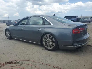 2015 Audi A8 4.0T with VIN WAU32AFD5FN040395, listed as a Copart auction lot 60909515 with 79,379 mi miles and Salvage title. Bid and sale history available at DreamBid. Image 2.