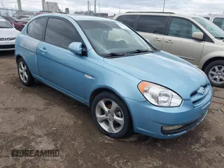 2007 Hyundai Accent SE z VIN KMHCN36C67U042592, wystawiony jako IAAI lot #42023579 z przebiegiem 205 000 mil mil oraz . Historia ofert i sprzedaży dostępna na DreamBid. Obrazek 1.