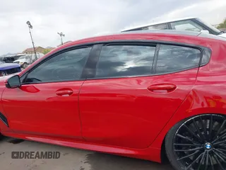2022 BMW 8 Series M850i z VIN WBAGV8C04NCH90015, wystawiony jako IAAI lot #42020711 z przebiegiem 39 801 mil mil oraz . Historia ofert i sprzedaży dostępna na DreamBid. Obrazek 14.