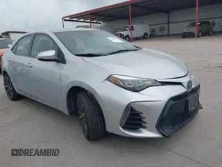 2017 Toyota Corolla L z VIN 2T1BURHE9HC780146, wystawiony jako IAAI lot #42401499 z przebiegiem 97 412 mil mil oraz . Historia ofert i sprzedaży dostępna na DreamBid. Obrazek 1.