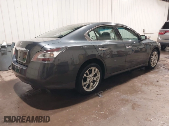 2013 Nissan Maxima SV with VIN 1N4AA5AP5DC801446, listed as a IAAI auction lot 41996092 with 124,823 mi miles and . Bid and sale history available at DreamBid. Image 4.