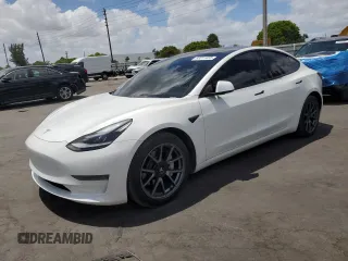 2021 Tesla Model 3 Standard Range Plus with VIN 5YJ3E1EA2MF985463, listed as a Copart auction lot 53311455 with 23,176 mi miles and Clean Title. Bid and sale history available at DreamBid. Image 1.