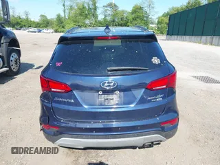 2018 Hyundai Santa Fe Ultimate with VIN 5XYZWDLA3JG571432, listed as a IAAI auction lot 42395245 with 69,330 mi miles and . Bid and sale history available at DreamBid. Image 16.