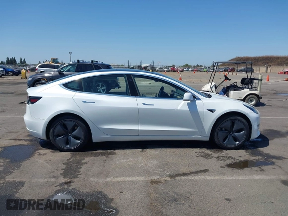2020 Tesla Model 3 Standard Range Plus z VIN 5YJ3E1EA6LF659311, wystawiony jako IAAI lot #42363341 z przebiegiem 96 378 mil mil oraz . Historia ofert i sprzedaży dostępna na DreamBid. Obrazek 14.