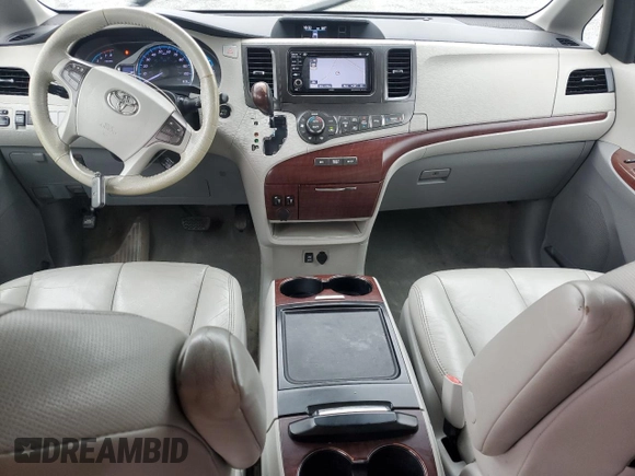2013 Toyota Sienna XLE with VIN 5TDDK3DC3DS065980, listed as a Copart auction lot 50563385 with 124,124 mi miles and Salvage Title. Bid and sale history available at DreamBid. Image 8.