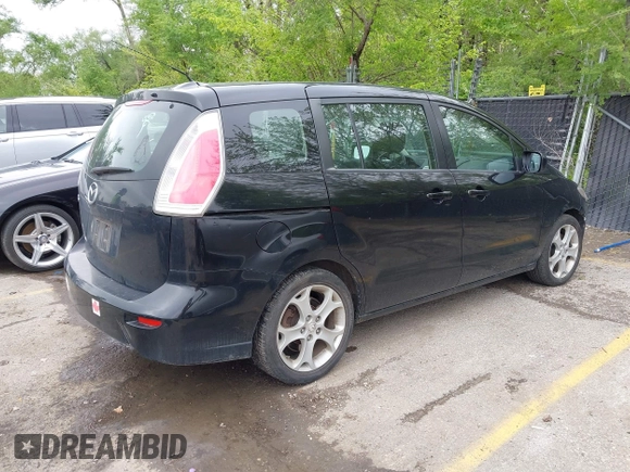 2010 Mazda 5 Sport with VIN JM1CR2W33A0360848, listed as a IAAI auction lot 42104824 with 151,084 mi miles and . Bid and sale history available at DreamBid. Image 4.