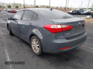 2016 Kia Forte LX with VIN KNAFX4A65G5603679, listed as a IAAI auction lot 42061229 with 89,413 mi miles. Bid and sale history available at carsss.com. Image 3.