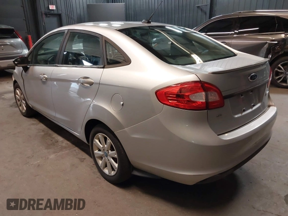 2012 Ford Fiesta SE with VIN 3FADP4BJ1CM110315, listed as a IAAI auction lot 39266357 with 144,749 mi miles. Bid and sale history available at carsss.com. Image 3.