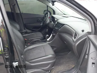 2020 Chevrolet Trax LT with VIN KL7CJLSBXLB003682, listed as a IAAI auction lot 41841753 with 114,624 mi miles and . Bid and sale history available at DreamBid. Image 5.