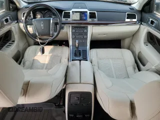 2012 Lincoln MKS z VIN 1LNHL9ER0CG803078, wystawiony jako Copart lot #60514765 z przebiegiem 82 715 mil mil oraz Szkoda całkowita • Salvage title. Historia ofert i sprzedaży dostępna na DreamBid. Obrazek 8.