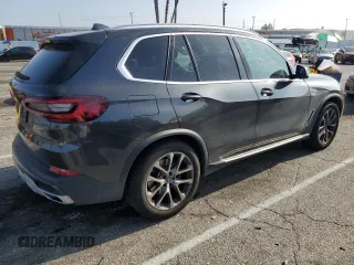 2022 BMW X5 xDrive40i with VIN 5UXCR6C02N9N18226, listed as a Copart auction lot 50031523 with 13,907 mi miles. Bid and sale history available at carsss.com. Image 3.