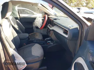 2023 Ford Maverick XL z VIN 3FTTW8E94PRA59855, wystawiony jako IAAI lot #40907807 z przebiegiem 21 779 mil mil oraz . Historia ofert i sprzedaży dostępna na DreamBid. Obrazek 5.