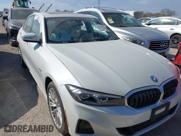 2023 BMW 3 Series 330e xDrive with VIN 3MW39FS0XP8D03304, listed as a IAAI auction lot 41358861 with 33,899 mi miles. Bid and sale history available at carsss.com. Image 1.