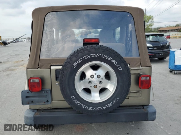 2003 Jeep Wrangler Sahara with VIN 1J4FA59S13P312830, listed as a Copart auction lot 52730955 with 99,247 mi miles and Salvage title. Bid and sale history available at DreamBid. Image 6.