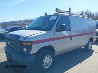 2013 Ford Econoline Cargo Commercial with VIN 1FTNE2EW4DDA30116, listed as a IAAI auction lot 42040770 with 88,468 mi miles and . Bid and sale history available at DreamBid. Image 2.