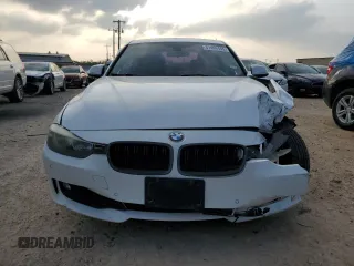 2014 BMW 3 Series 328i with VIN WBA3C1C52EK111563, listed as a Copart auction lot 51465165 with 142,125 mi miles and Salvage title. Bid and sale history available at DreamBid. Image 5.