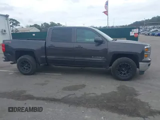 2015 Chevrolet Silverado 1500 LT with VIN 3GCUKREC9FG519510, listed as a IAAI auction lot 42026865 with 119,510 mi miles and . Bid and sale history available at DreamBid. Image 13.