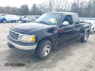 2000 Ford F-150 XL with VIN 1FTZX0725YKA09559, listed as a IAAI auction lot 41810954 with Not provided miles and . Bid and sale history available at DreamBid. Image 6.