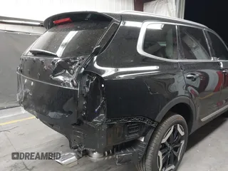 2025 Kia Telluride S with VIN 5XYP64GC9SG580656, listed as a IAAI auction lot 42000035 with 4,169 mi miles and . Bid and sale history available at DreamBid. Image 6.