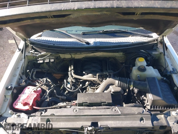 2014 Ford F-150 XL with VIN 1FTFW1EF9EKF06661, listed as a IAAI auction lot 42235635 with 327,584 mi miles and . Bid and sale history available at DreamBid. Image 10.