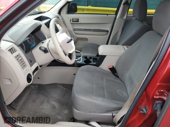 2012 Ford Escape XLS with VIN 1FMCU9C71CKB13734, listed as a Copart auction lot 55331865 with 182,323 mi miles and Salvage title. Bid and sale history available at DreamBid. Image 7.