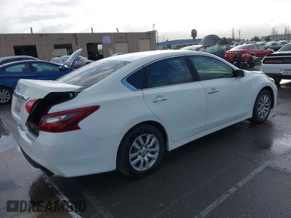 2016 Nissan Altima SR with VIN 1N4AL3AP5GC220645, listed as a IAAI auction lot 41938564 with 202,222 mi miles and . Bid and sale history available at carsss.com. Image 4.