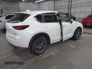 2017 Mazda CX-5 Touring with VIN JM3KFBCL9H0107589, listed as a IAAI auction lot 41241481 with 77,032 mi miles. Bid and sale history available at carsss.com. Image 4.