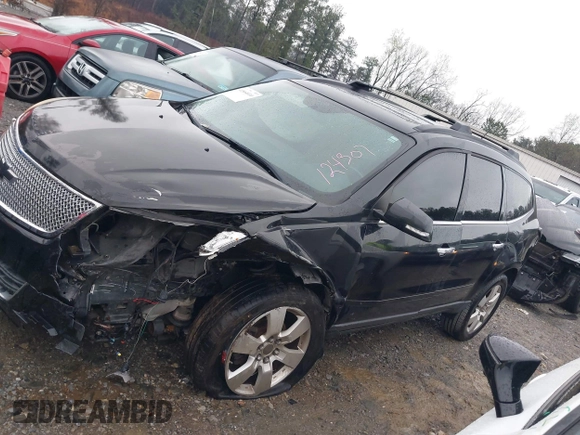 2013 Chevrolet Traverse LT with VIN 1GNKVJKD9DJ124307, listed as a IAAI auction lot 41864010 with 123,458 mi miles and . Bid and sale history available at DreamBid. Image 14.