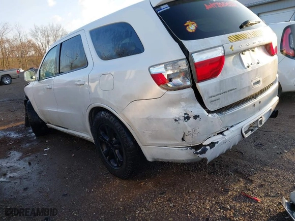 2013 Dodge Durango SXT with VIN 1C4RDJAGXDC564904, listed as a IAAI auction lot 41833540 with 208,581 mi miles. Bid and sale history available at carsss.com. Image 3.