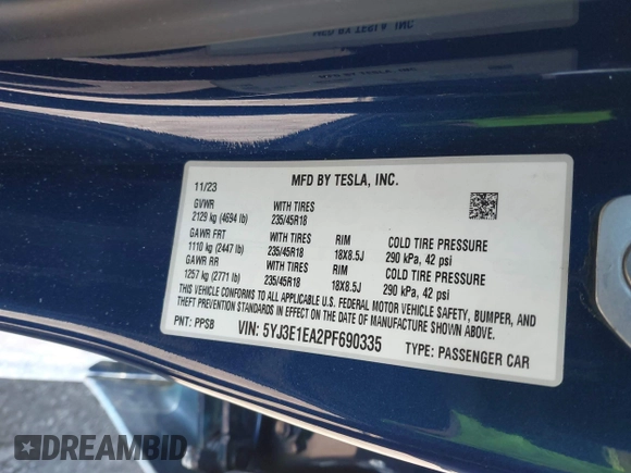 2023 Tesla Model 3 with VIN 5YJ3E1EA2PF690335, listed as a IAAI auction lot 41732701 with 22,238 mi miles and . Bid and sale history available at DreamBid. Image 9.
