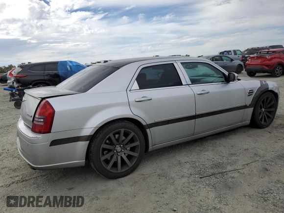 2007 Chrysler 300 C SRT8 with VIN 2C3LA73W07H660214, listed as a Copart auction lot 70283834 with 249,130 mi miles and Salvage Title. Bid and sale history available at carsss.com. Image 3.