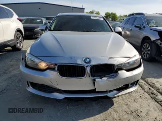 2014 BMW 3 Series 320i with VIN WBA3B1C56EK135528, listed as a Copart auction lot 53075575 with 131,341 mi miles and Salvage Title. Bid and sale history available at carsss.com. Image 5.