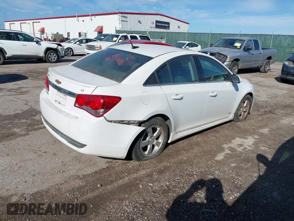 2014 Chevrolet Cruze 1LT z VIN 1G1PC5SB5E7190497, wystawiony jako IAAI lot #41399147 z przebiegiem 159 724 mil mil oraz . Historia ofert i sprzedaży dostępna na DreamBid. Obrazek 4.
