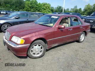 1999 Mercedes-Benz C 230/260/280/320 z VIN WDBHA24G3XA698190, wystawiony jako Copart lot #61717535 z przebiegiem 98 449 mil mil oraz Czysty tytuł • Clean title. Historia ofert i sprzedaży dostępna na DreamBid. Obrazek 1.
