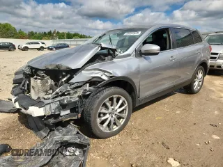 2014 Mazda CX-9 Grand Touring z VIN JM3TB3DA5E0440208, wystawiony jako Copart lot #65054965 z przebiegiem 158 629 mil mil oraz Nie do naprawy • Non repairable. Historia ofert i sprzedaży dostępna na DreamBid. Obrazek 1.
