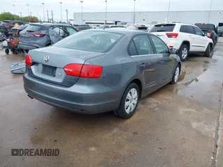 2013 Volkswagen Jetta SE with VIN 3VWDX7AJ9DM371414, listed as a IAAI auction lot 41861196 with 156,169 mi miles and . Bid and sale history available at DreamBid. Image 4.