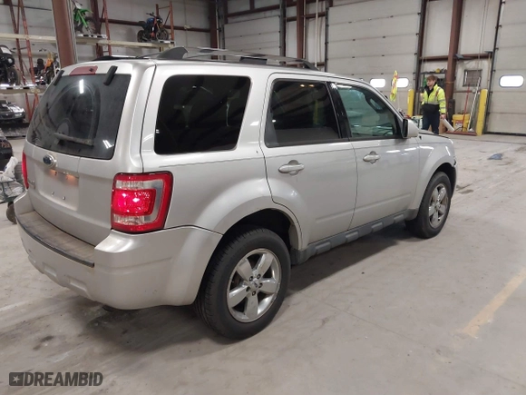 2011 Ford Escape Limited with VIN 1FMCU0EG7BKA43387, listed as a IAAI auction lot 41897571 with 224,780 mi miles. Bid and sale history available at carsss.com. Image 4.