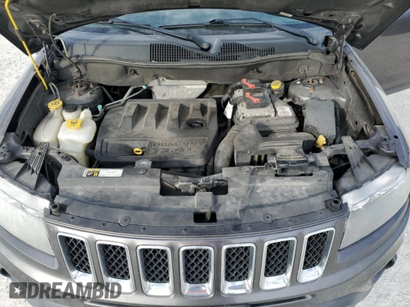 2016 Jeep Compass Sport SE with VIN 1C4NJDBBXGD523537, listed as a Copart auction lot 87664995 with 132,010 mi miles and Salvage title. Bid and sale history available at DreamBid. Image 12.