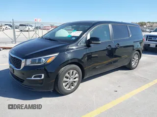 2020 Kia Sedona EX with VIN KNDMB5C18L6581794, listed as a IAAI auction lot 41767614 with 131,009 mi miles. Bid and sale history available at carsss.com. Image 2.