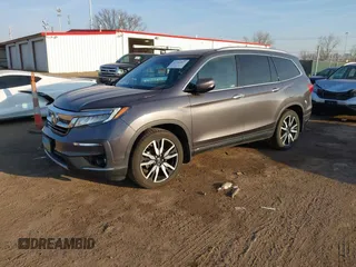 2019 Honda Pilot Touring 7-Passenger with VIN 5FNYF6H69KB050235, listed as a IAAI auction lot 41782057 with 85,907 mi miles. Bid and sale history available at carsss.com. Image 2.