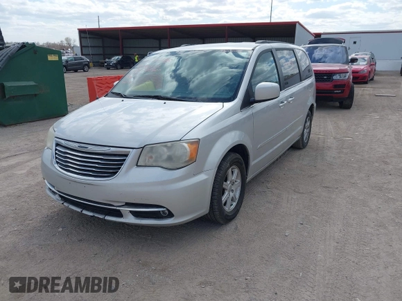 2011 Chrysler Town & Country Touring with VIN 2A4RR5DGXBR780044, listed as a IAAI auction lot 42035045 with 205,627 mi miles and . Bid and sale history available at DreamBid. Image 2.