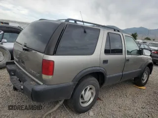 1999 Chevrolet Blazer Trailblazer z VIN 1GNDT13W9X2238417, wystawiony jako Copart lot #80087223 z przebiegiem Nie podano mil oraz Szkoda całkowita • Salvage title. Historia ofert i sprzedaży dostępna na DreamBid. Obrazek 3.