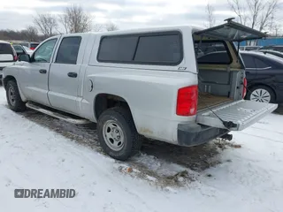 2006 Dodge Dakota ST with VIN 1D7HE28K56S636387, listed as a IAAI auction lot 41305723 with 104,821 mi miles and . Bid and sale history available at carsss.com. Image 3.