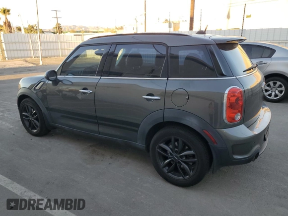 2014 MINI Countryman S with VIN WMWZC3C59EWP29137, listed as a Copart auction lot 79721804 with 124,871 mi miles and Salvage title. Bid and sale history available at DreamBid. Image 2.