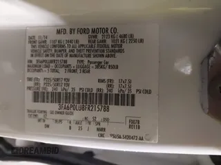 2015 Ford Fusion SE Hybrid with VIN 3FA6P0LU8FR215788, listed as a IAAI auction lot 42038194 with 136,949 mi miles and . Bid and sale history available at DreamBid. Image 9.