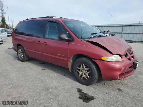 1999 Dodge Caravan SE with VIN 2B4GP44G0XR343218, listed as a Copart auction lot 84544294 with 250,647 mi miles and Salvage Title. Bid and sale history available at carsss.com. Image 4.