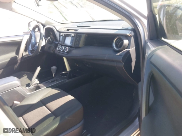 2018 Toyota RAV4 LE with VIN JTMZFREVXJJ196183, listed as a IAAI auction lot 41776107 with 82,713 mi miles. Bid and sale history available at carsss.com. Image 5.