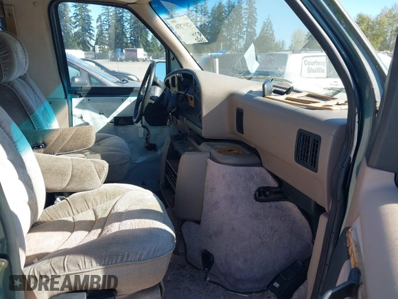 1995 Ford Econoline Cargo with VIN 1FDEE14H3SHB23319, listed as a IAAI auction lot 42057536 with 108,620 mi miles and . Bid and sale history available at DreamBid. Image 5.